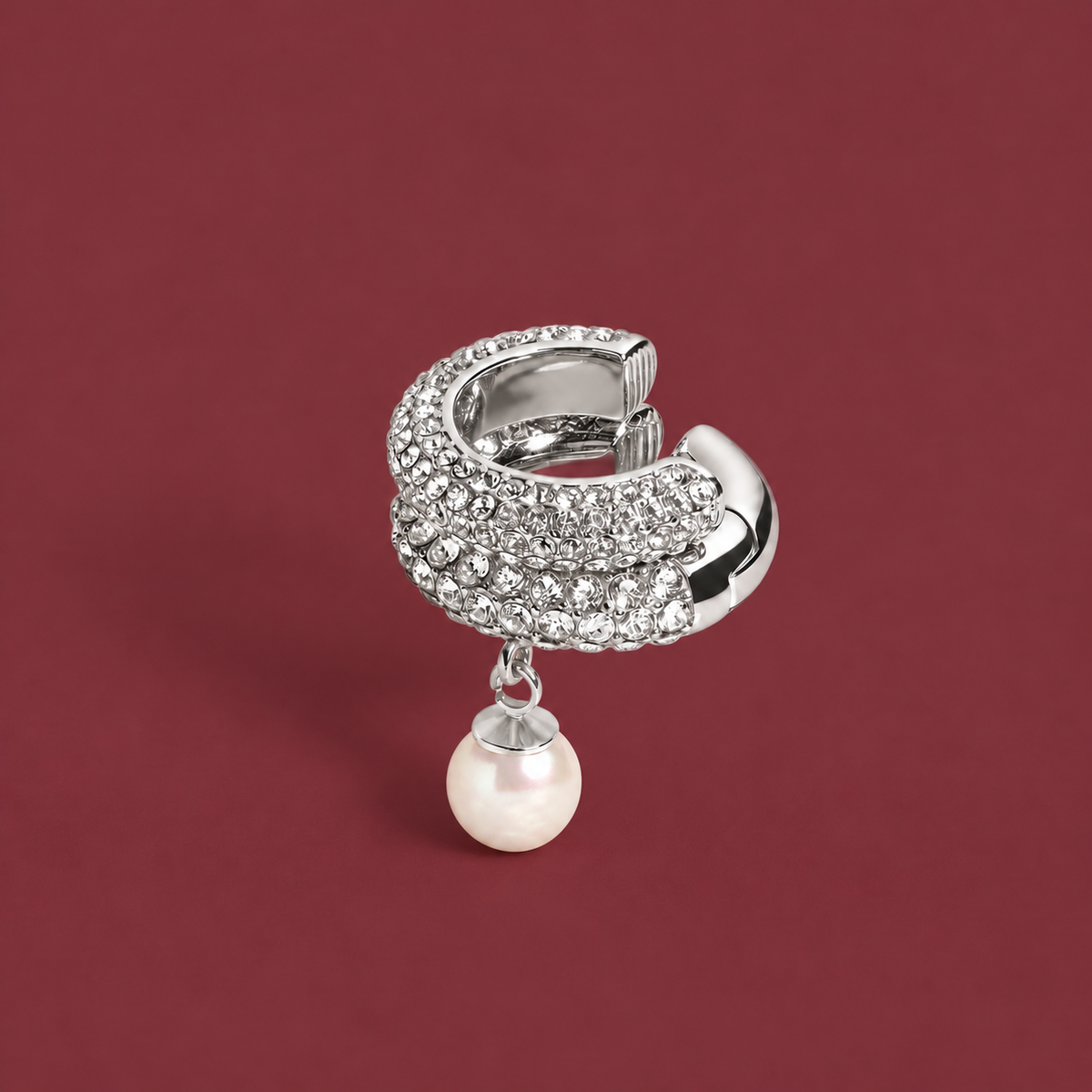 Pearl Crystal Ear Cuff — muted burgundy background