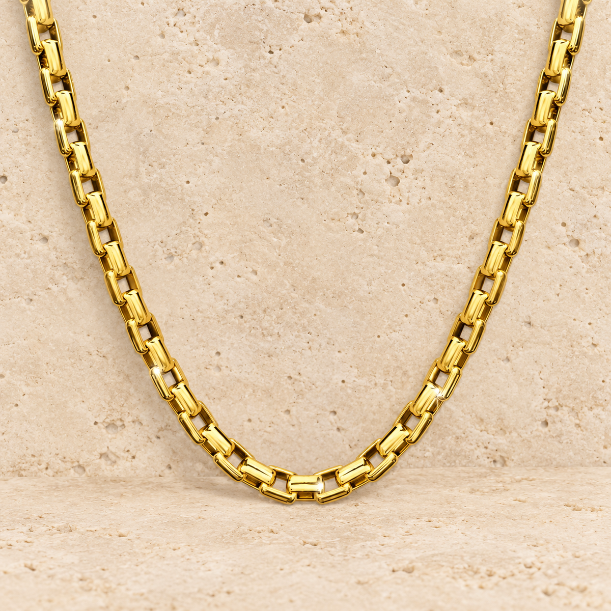 Gold Box Chain — pale beige natural stone background