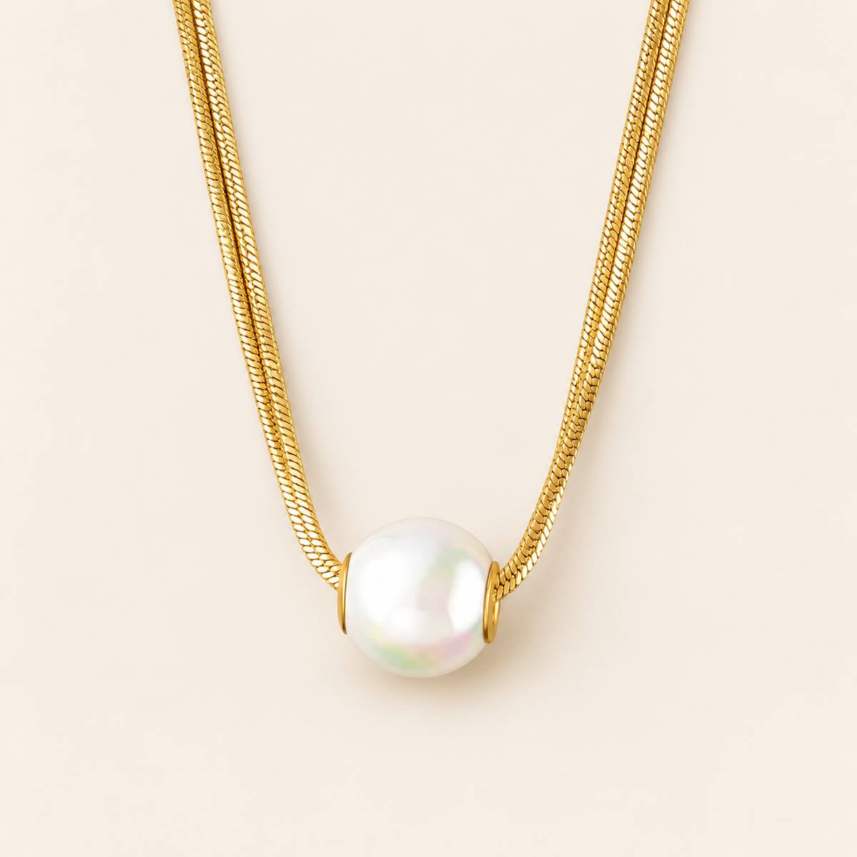 Freshwater Pearl Pendant — warm ivory background
