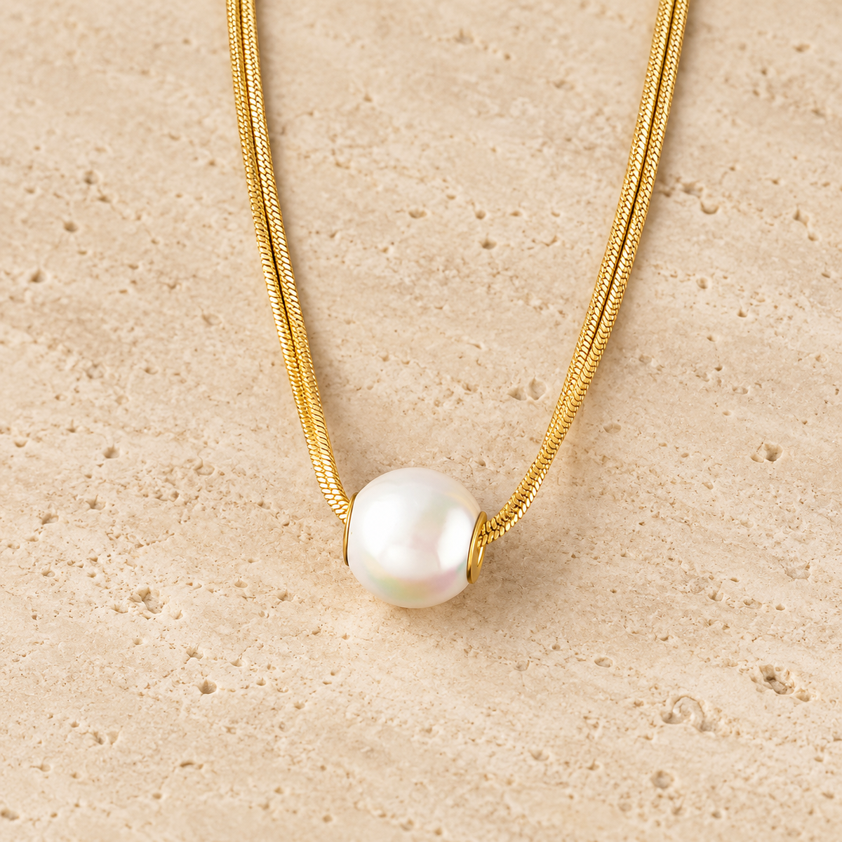 Freshwater Pearl Pendant — pale beige natural stone background