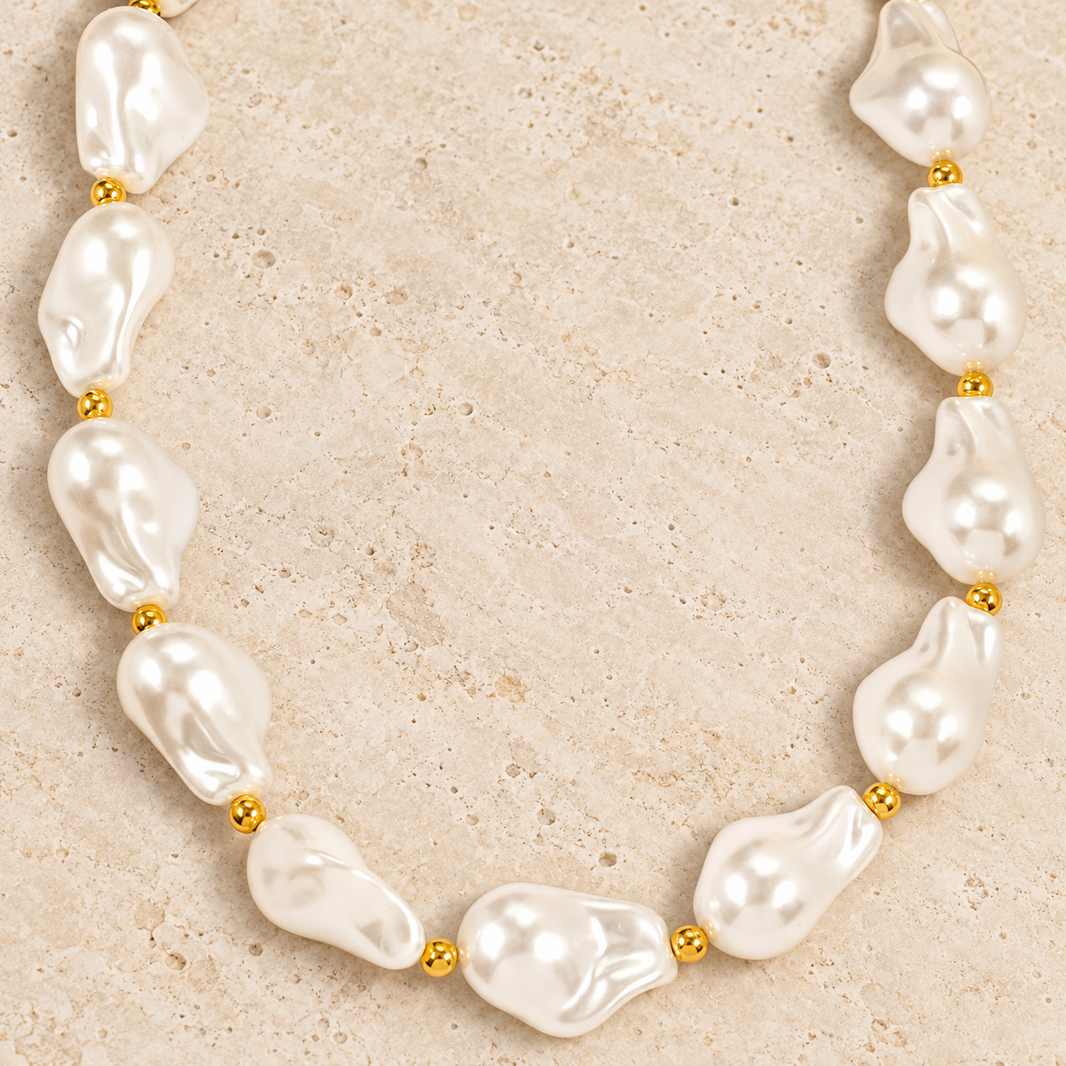 Baroque Pearl Choker — pale beige natural stone background