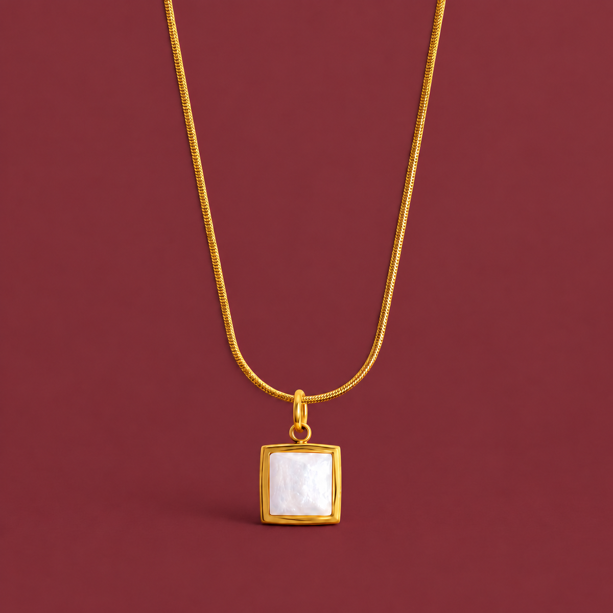White Shell Square Necklace — muted burgundy background
