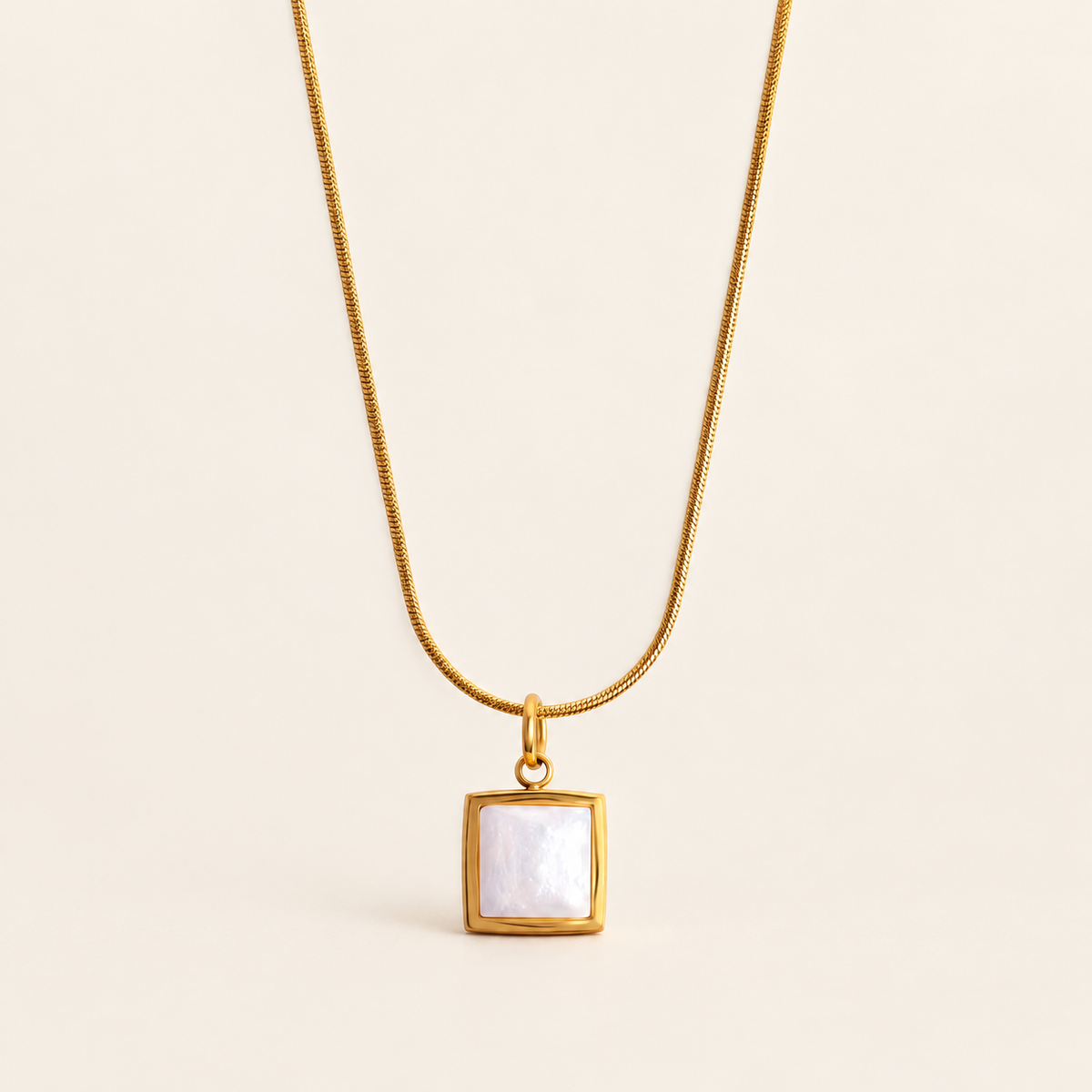White Shell Square Necklace — warm ivory background