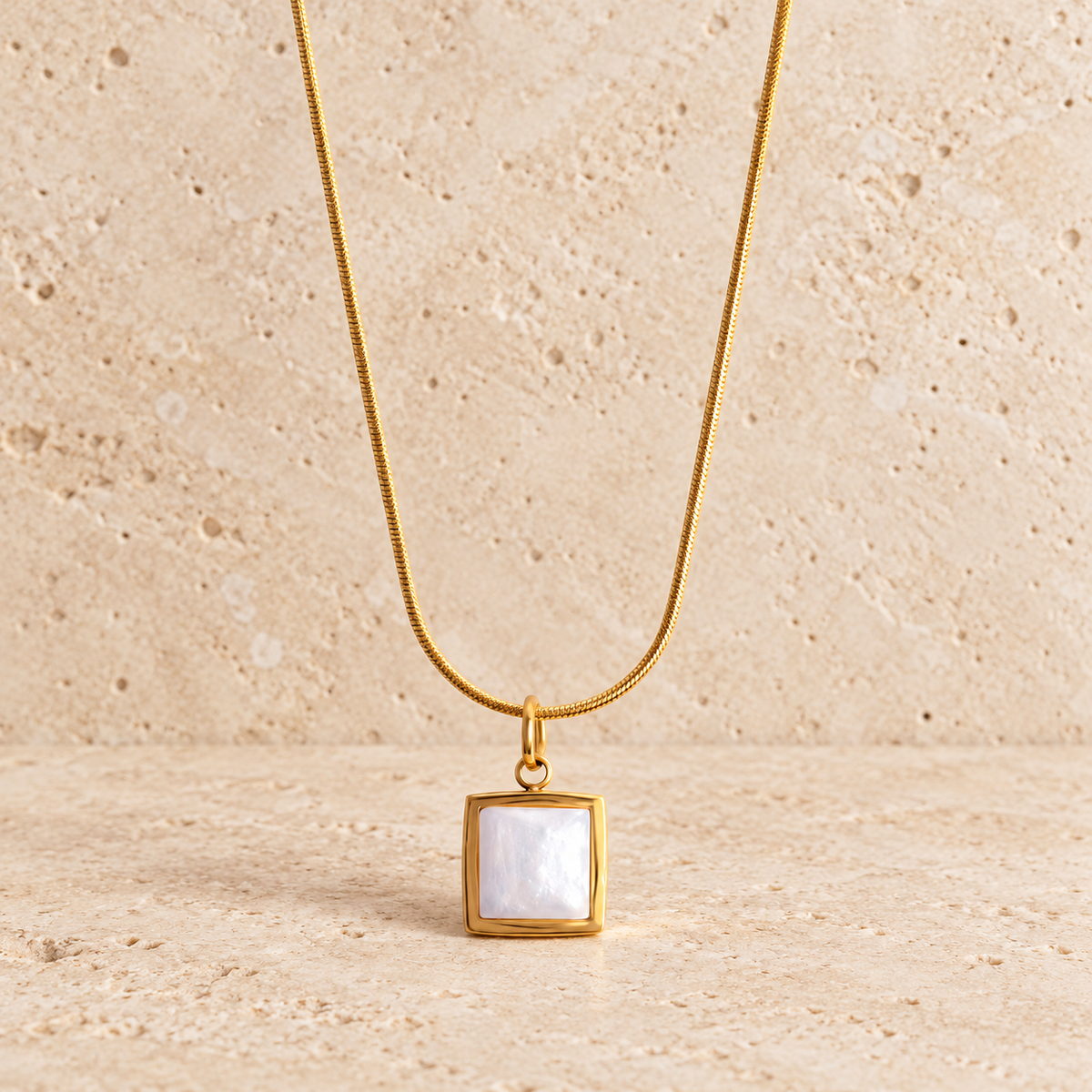 White Shell Square Necklace — pale beige natural stone background