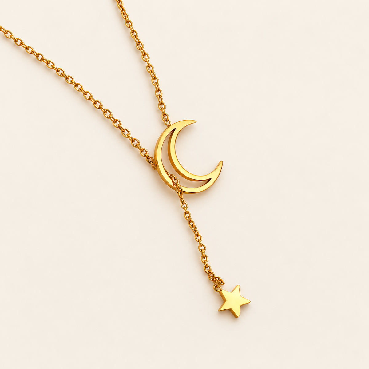 Moon & Star Necklace — warm ivory background