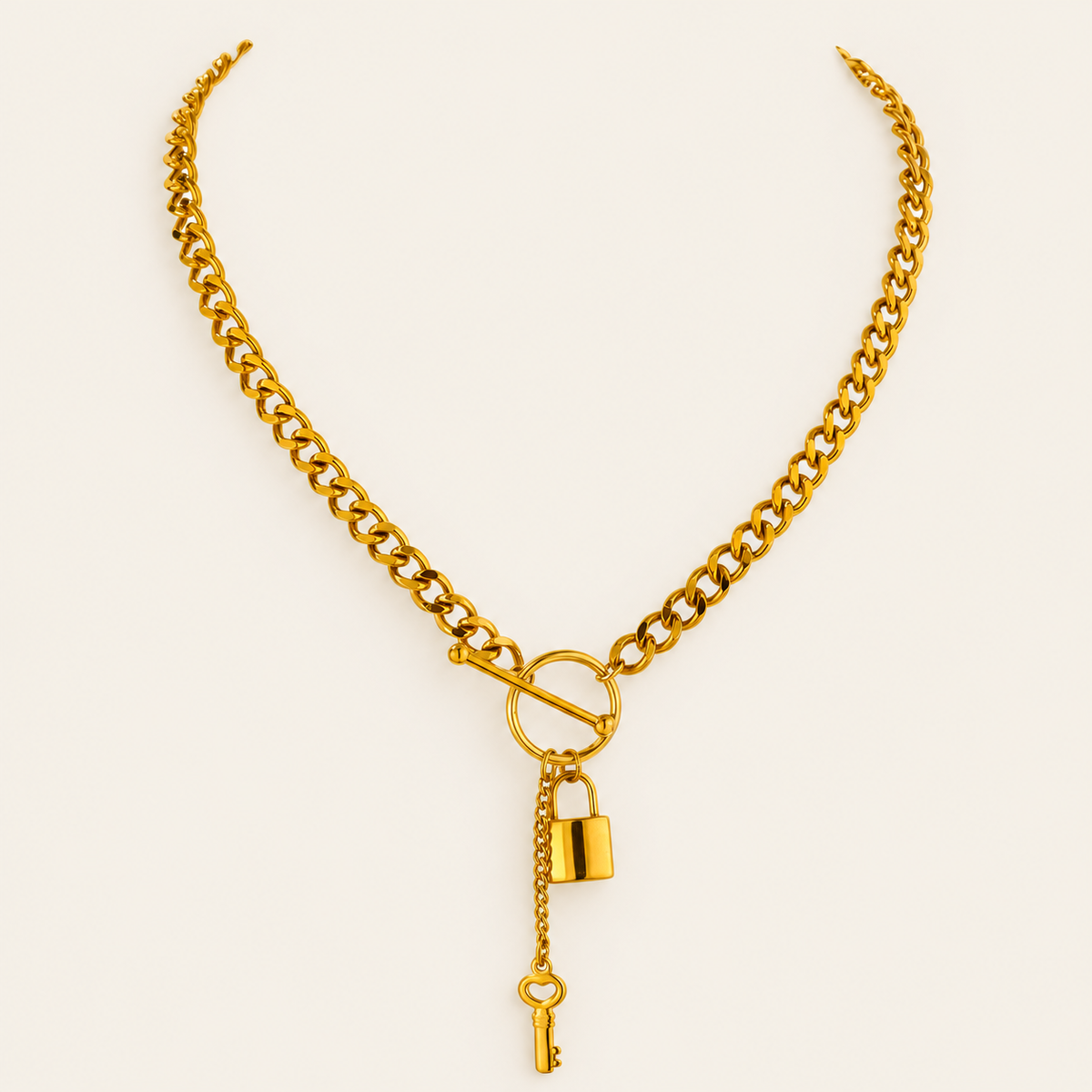 Gold Lock Necklace — warm ivory background