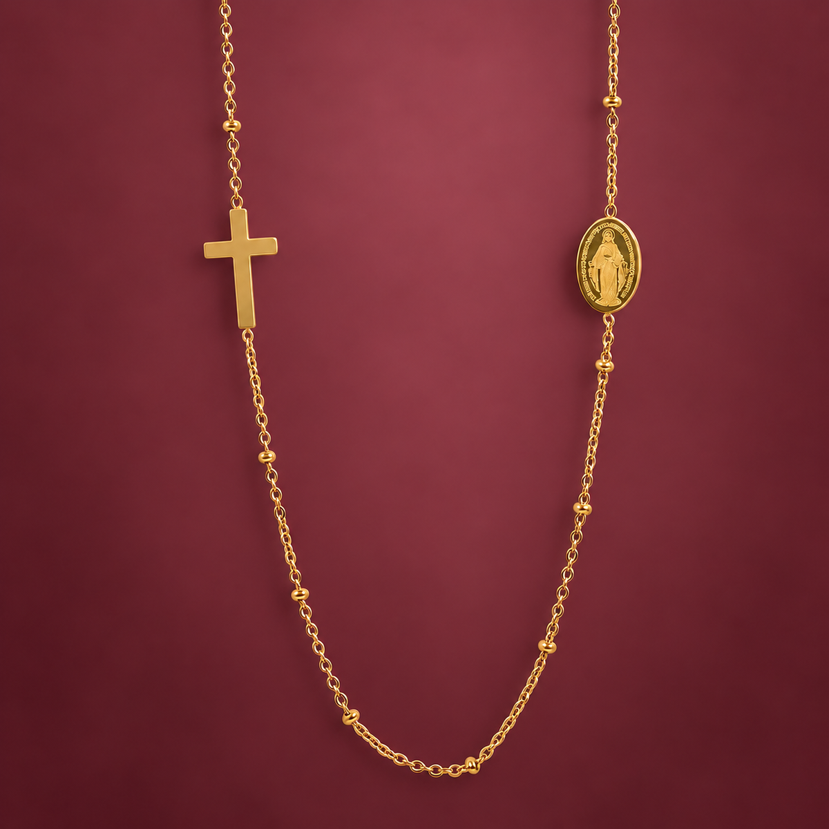 Gold-Tone Cross Necklace — muted burgundy background