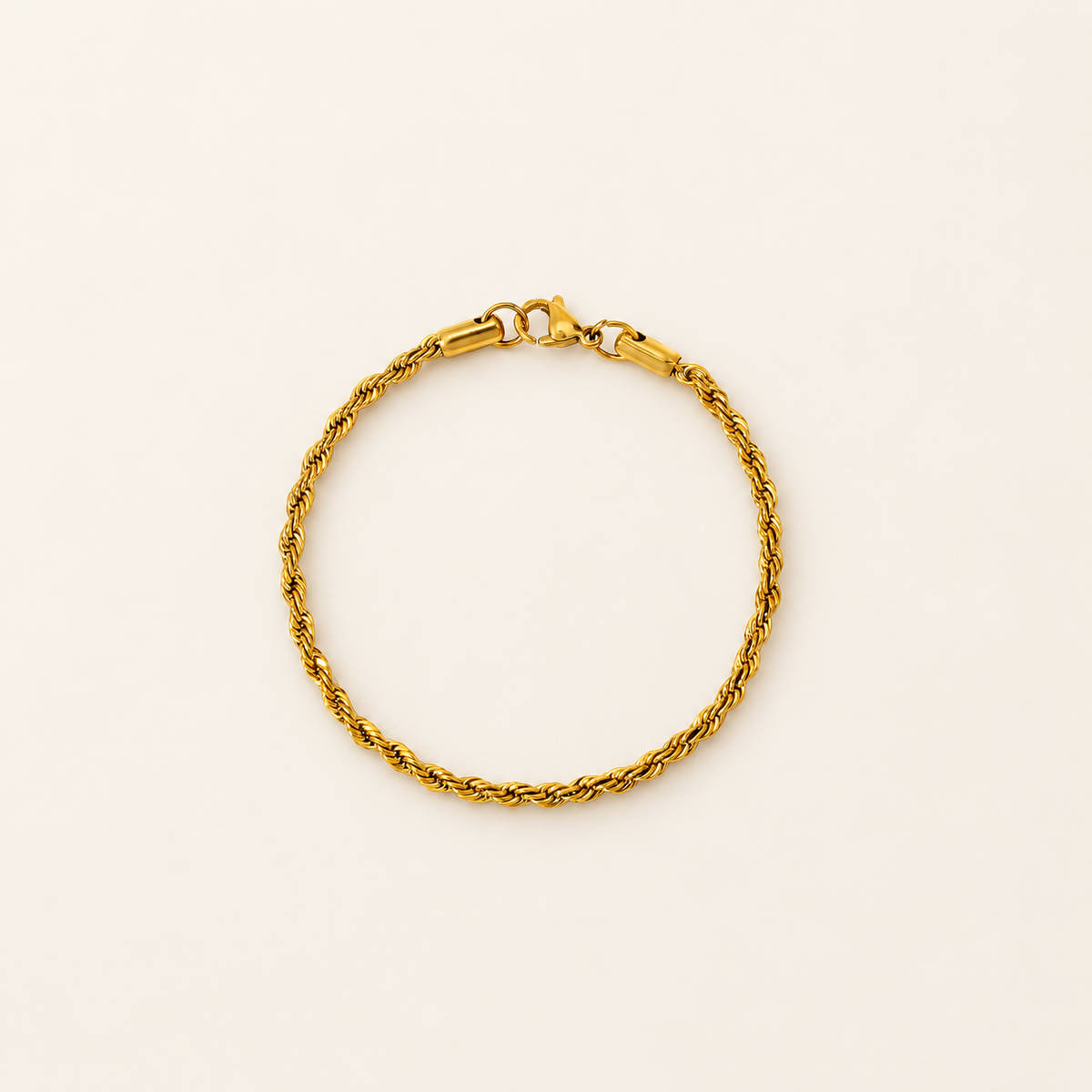 Gold Rope Bracelet — warm ivory background