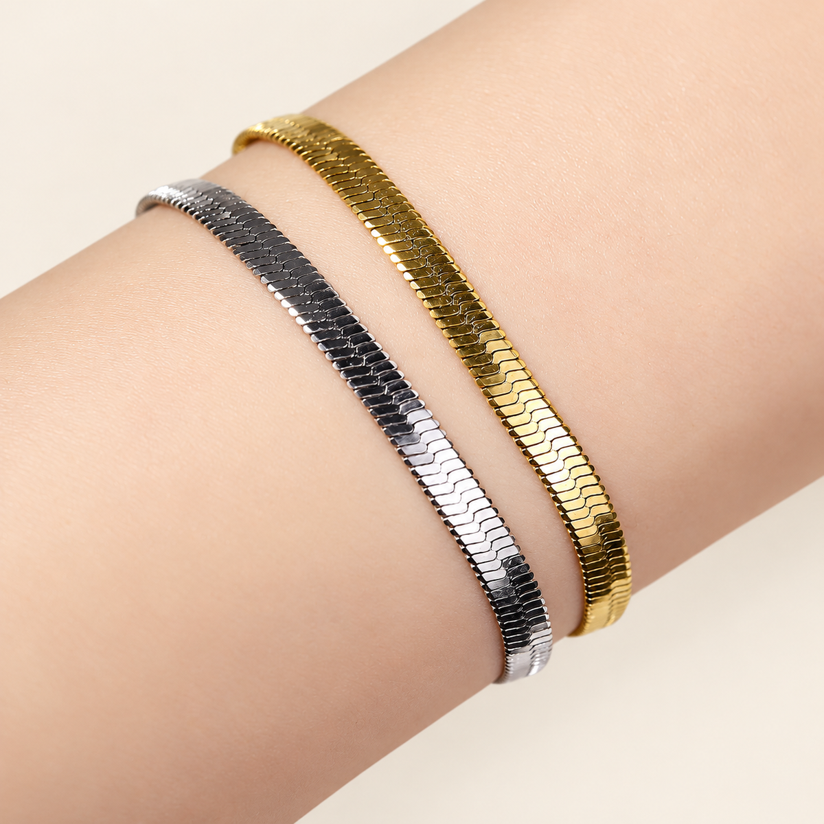 Gold Herringbone Bracelet — warm ivory background