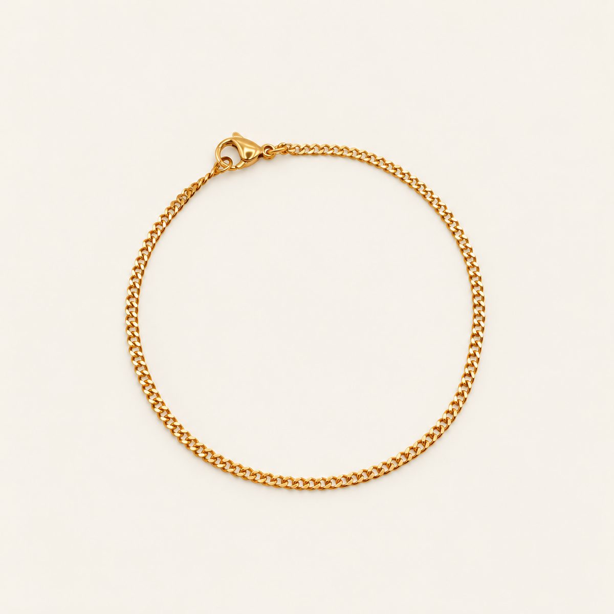 Gold Curb Bracelet — warm ivory background