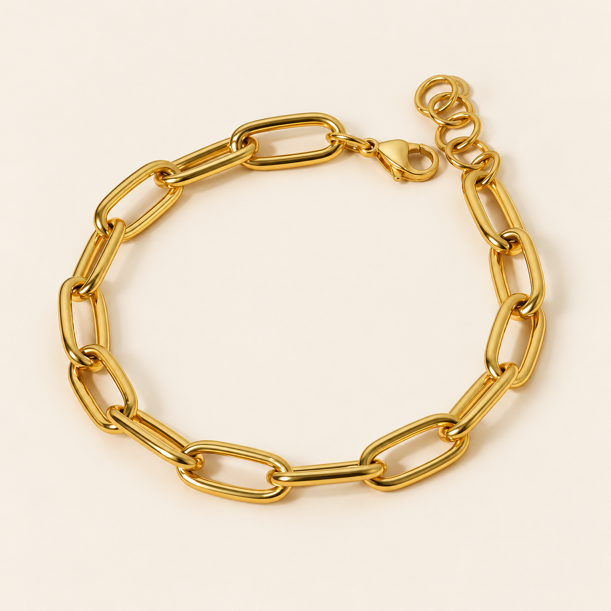 Chunky Gold Paperclip Bracelet — warm ivory background