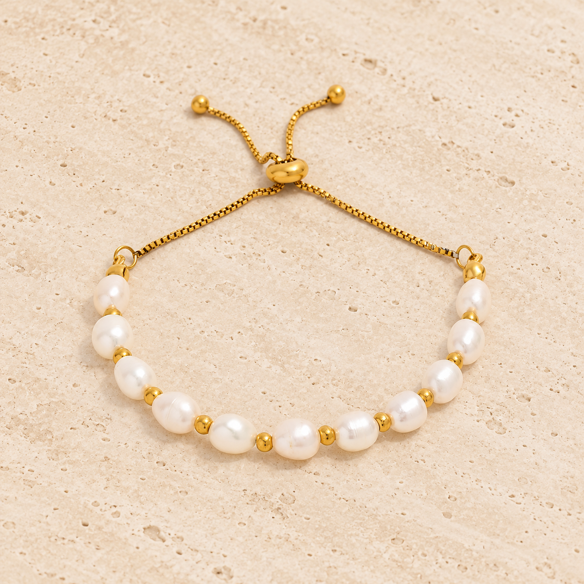 Freshwater Pearl Bracelet — pale beige natural stone background