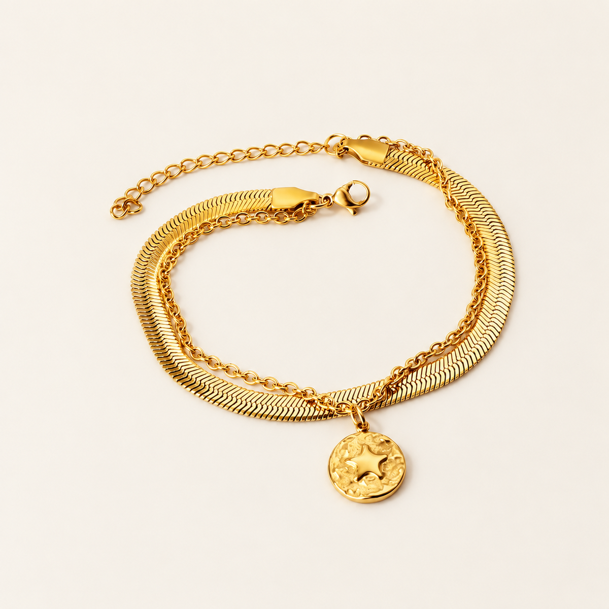 Delicate Gold Charm Bracelet — warm ivory background