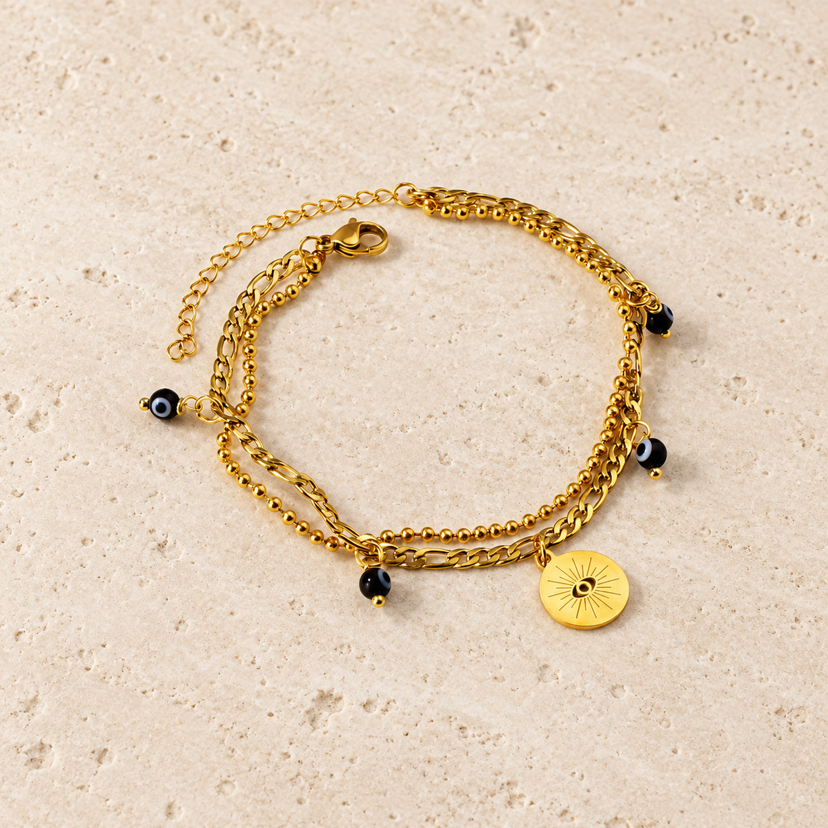 Gold Link Charm Bracelet — pale beige natural stone background