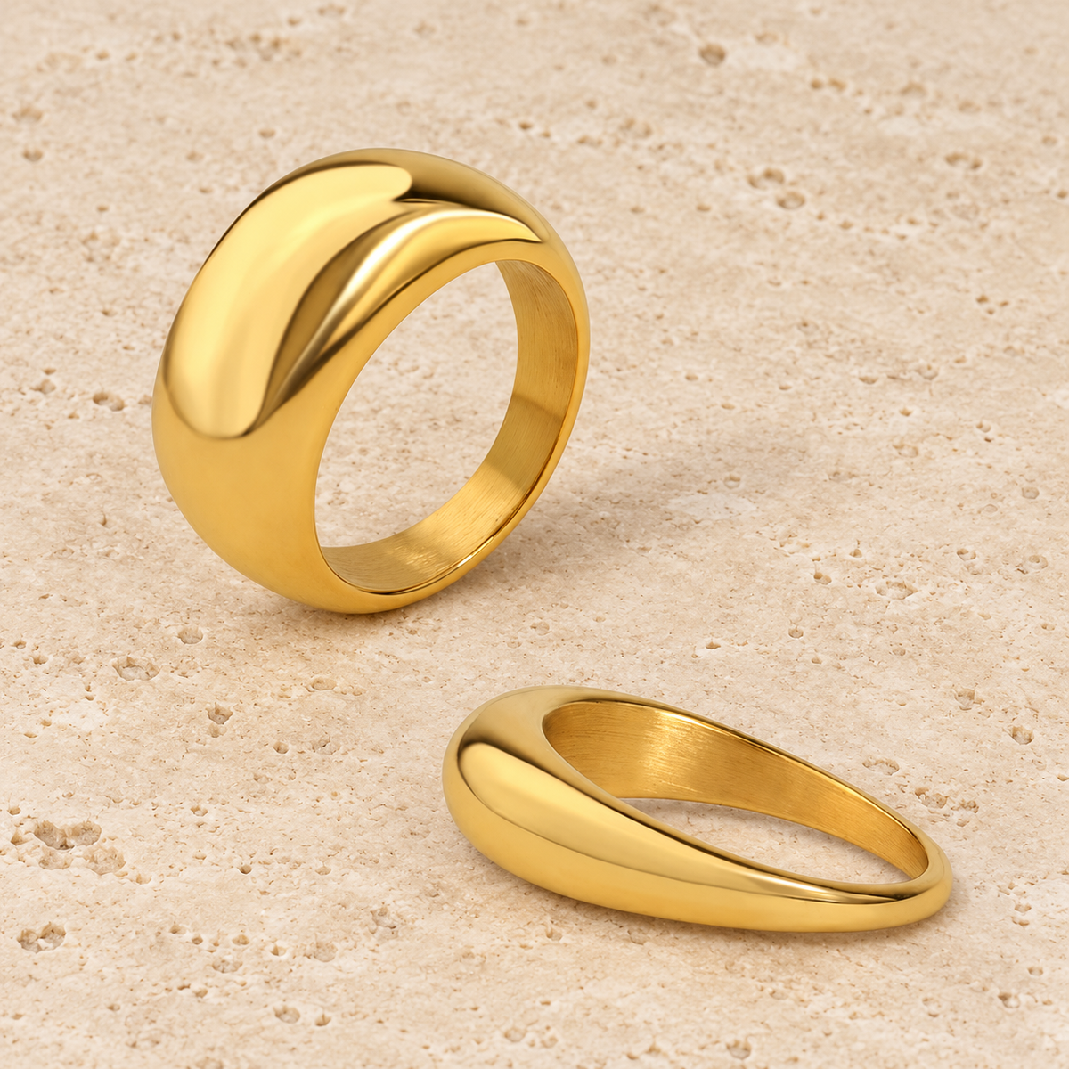 Chunky Gold Dome Ring — pale beige natural stone background
