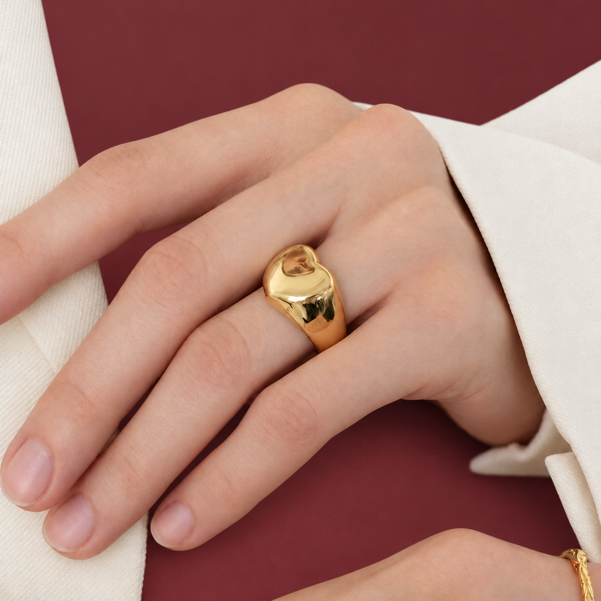 Gold-Tone Chain Detail Ring — muted burgundy background