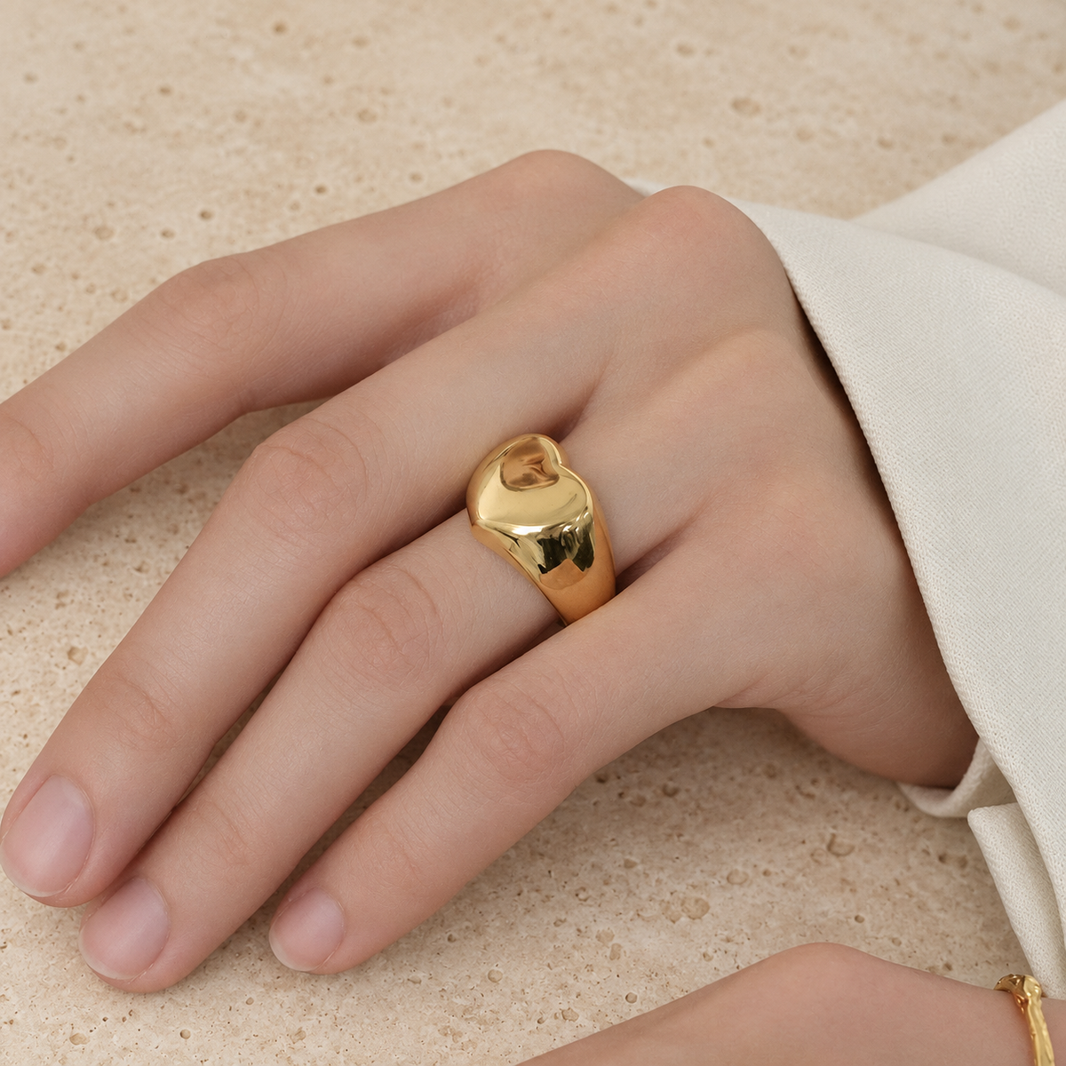 Gold Chain Detail Ring — pale beige natural stone background