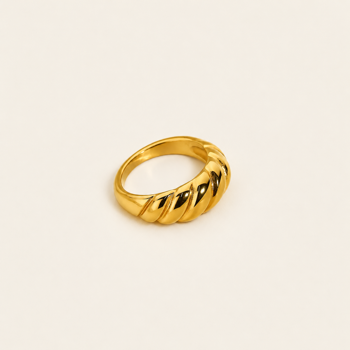 Gold Sculpted Statement Ring — warm ivory background