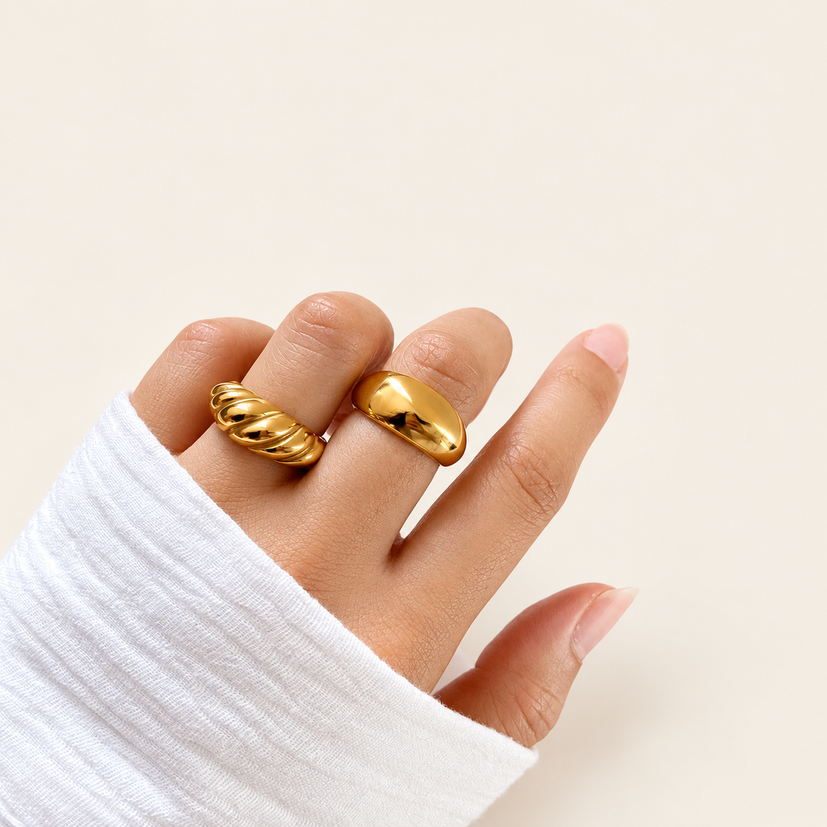 Gold Croissant Dome Ring — warm ivory background