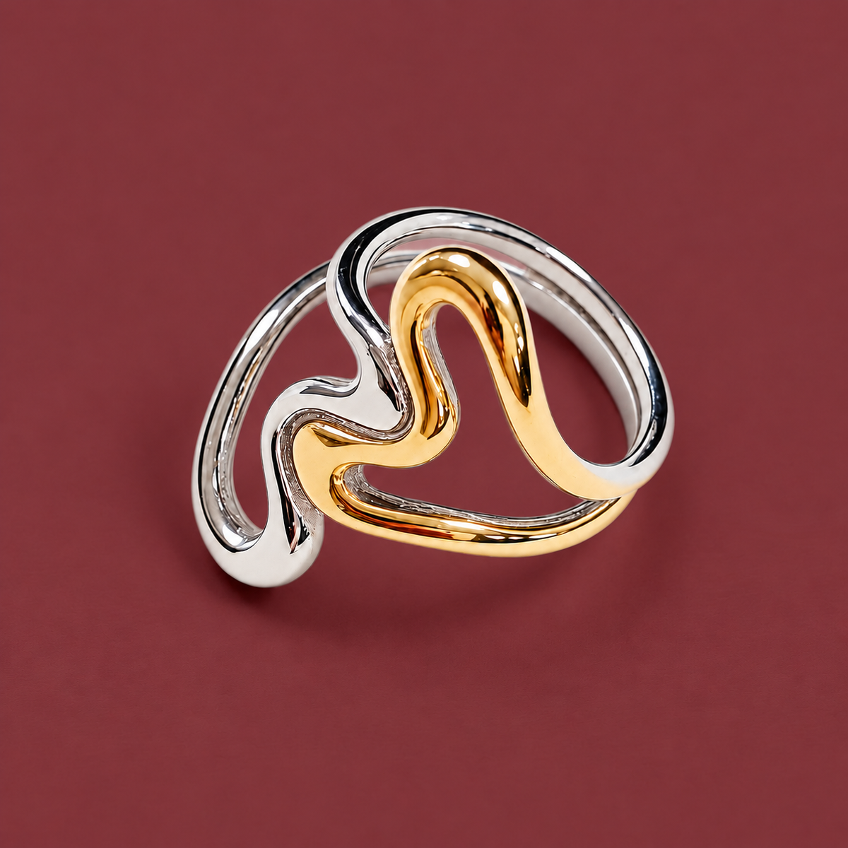 Two-Tone Heart Ring — muted burgundy background