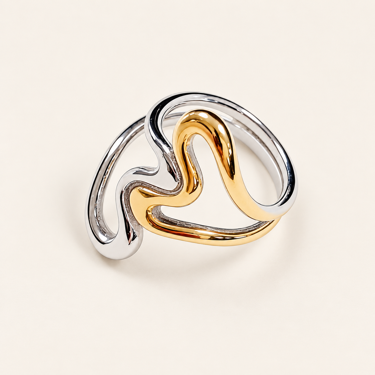 Two-Tone Heart Ring — warm ivory background