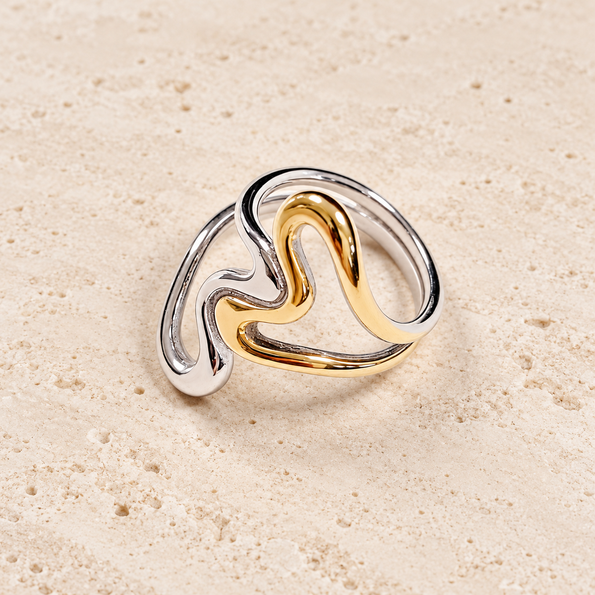 Two-Tone Heart Ring — pale beige natural stone background