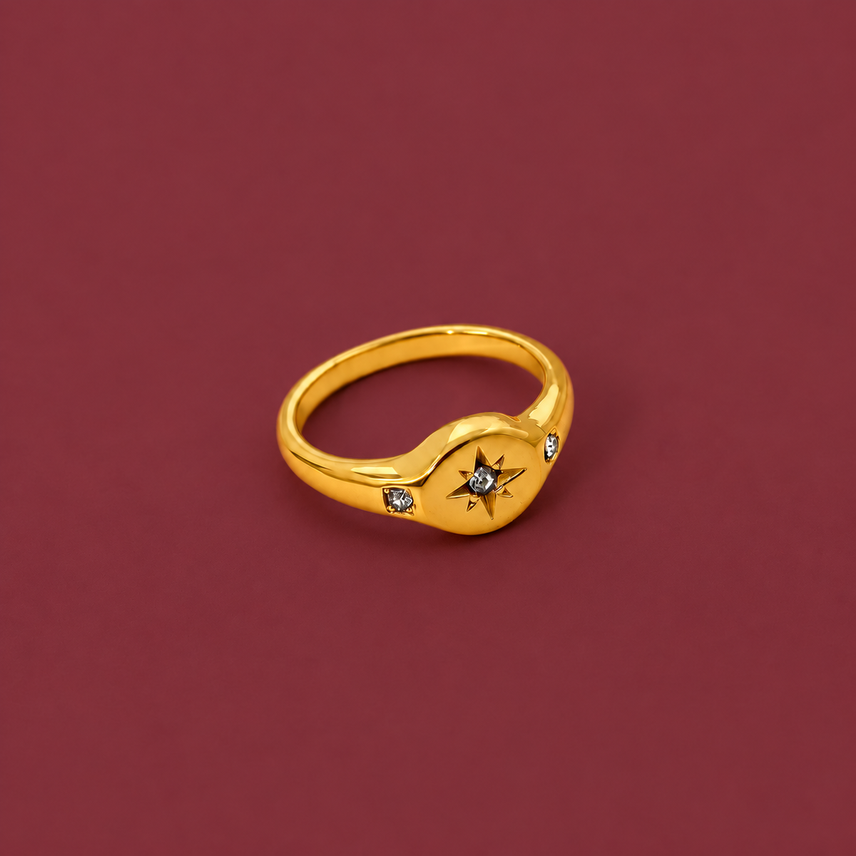 Gold-Tone Celestial Stone Ring — muted burgundy background