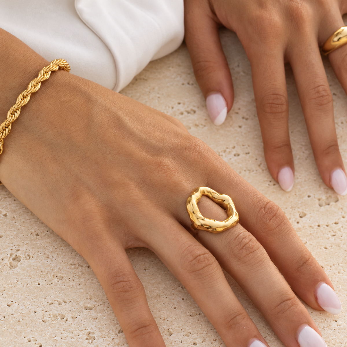 Gold Irregular Circle Ring — pale beige natural stone background
