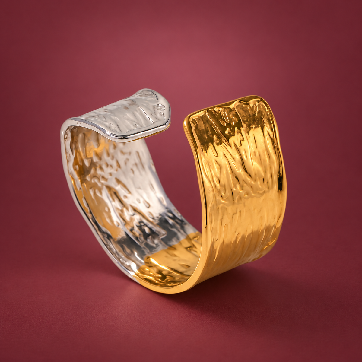 Gold-Tone Textured Wide Ring — muted burgundy background