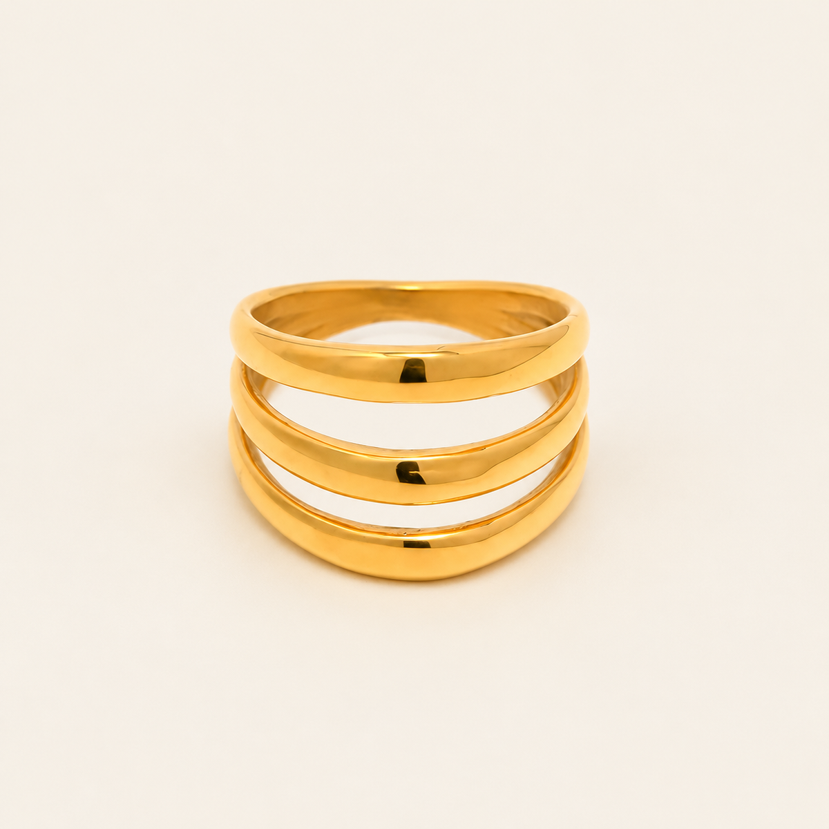 Triple Wave Statement Ring — warm ivory background