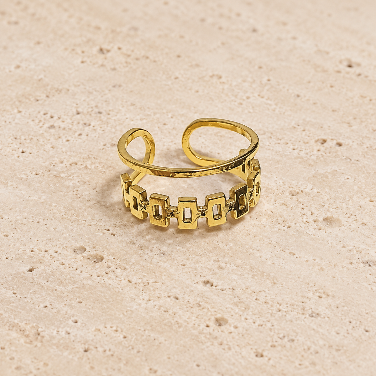 Geometric Open Band Ring — pale beige natural stone background