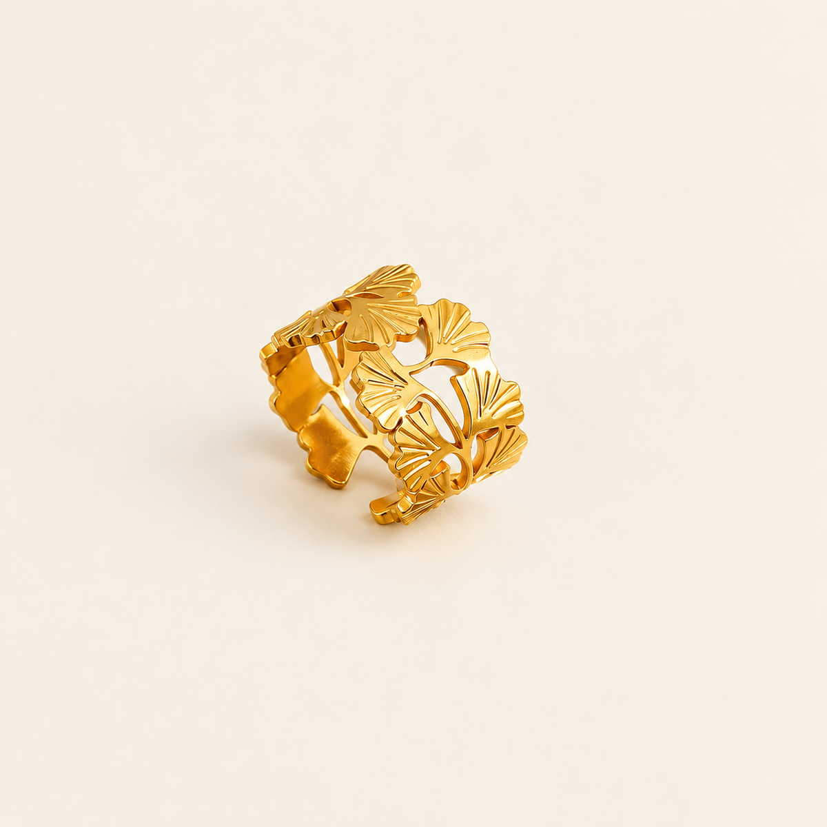 Sculpted Floral Ring — warm ivory background
