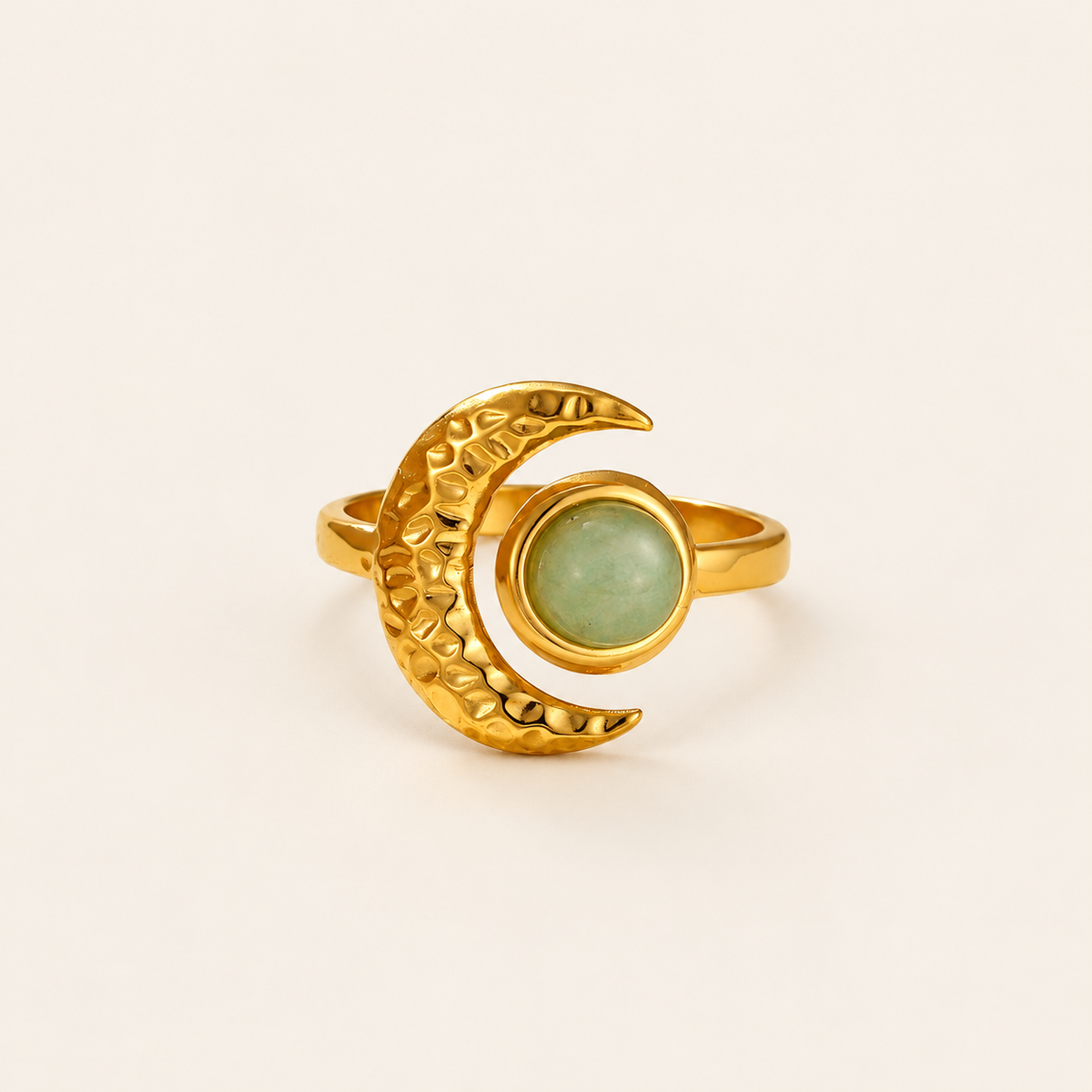 Green Moon Ring — warm ivory background