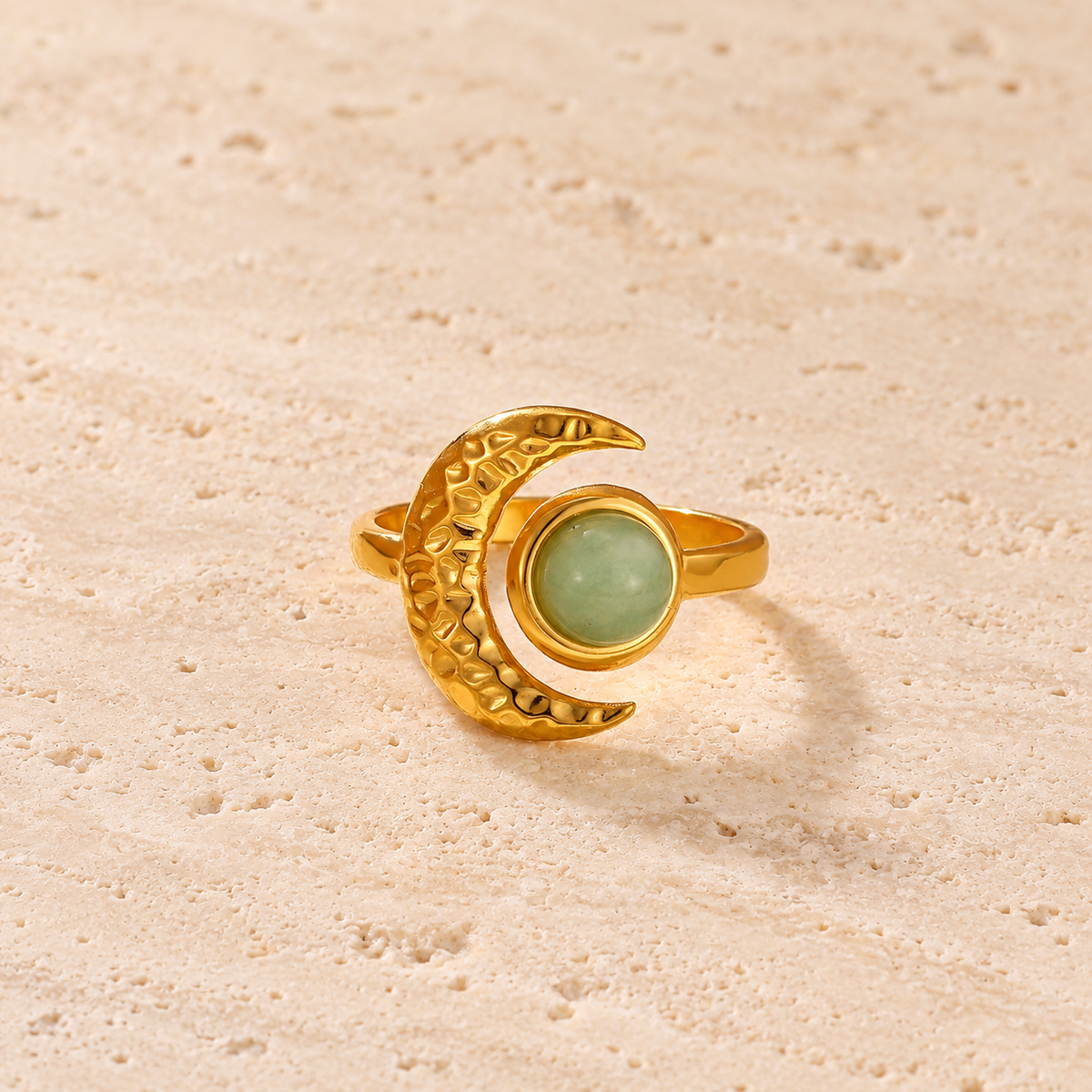 Green Moon Ring — pale beige natural stone background