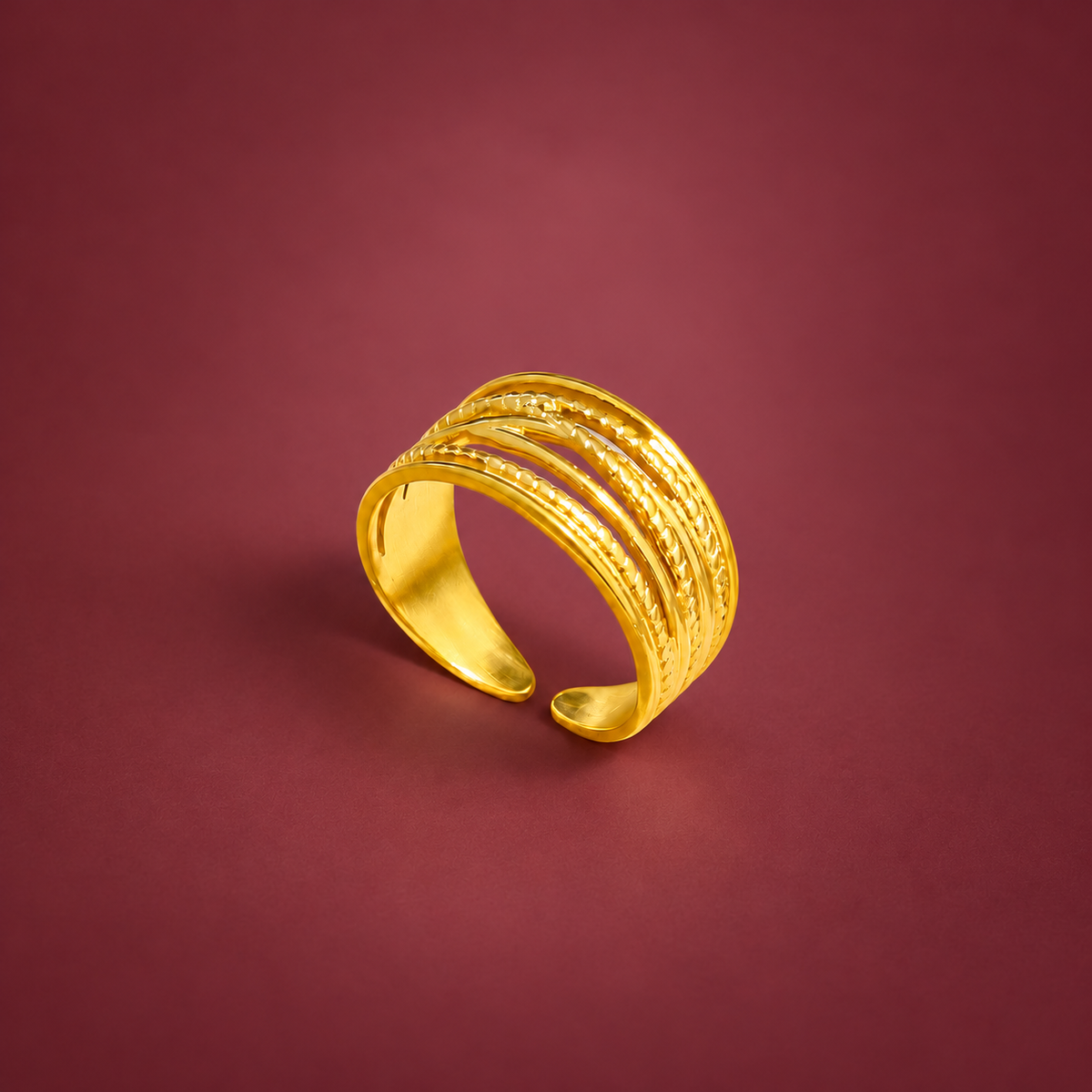 Textured Layer Ring — muted burgundy background