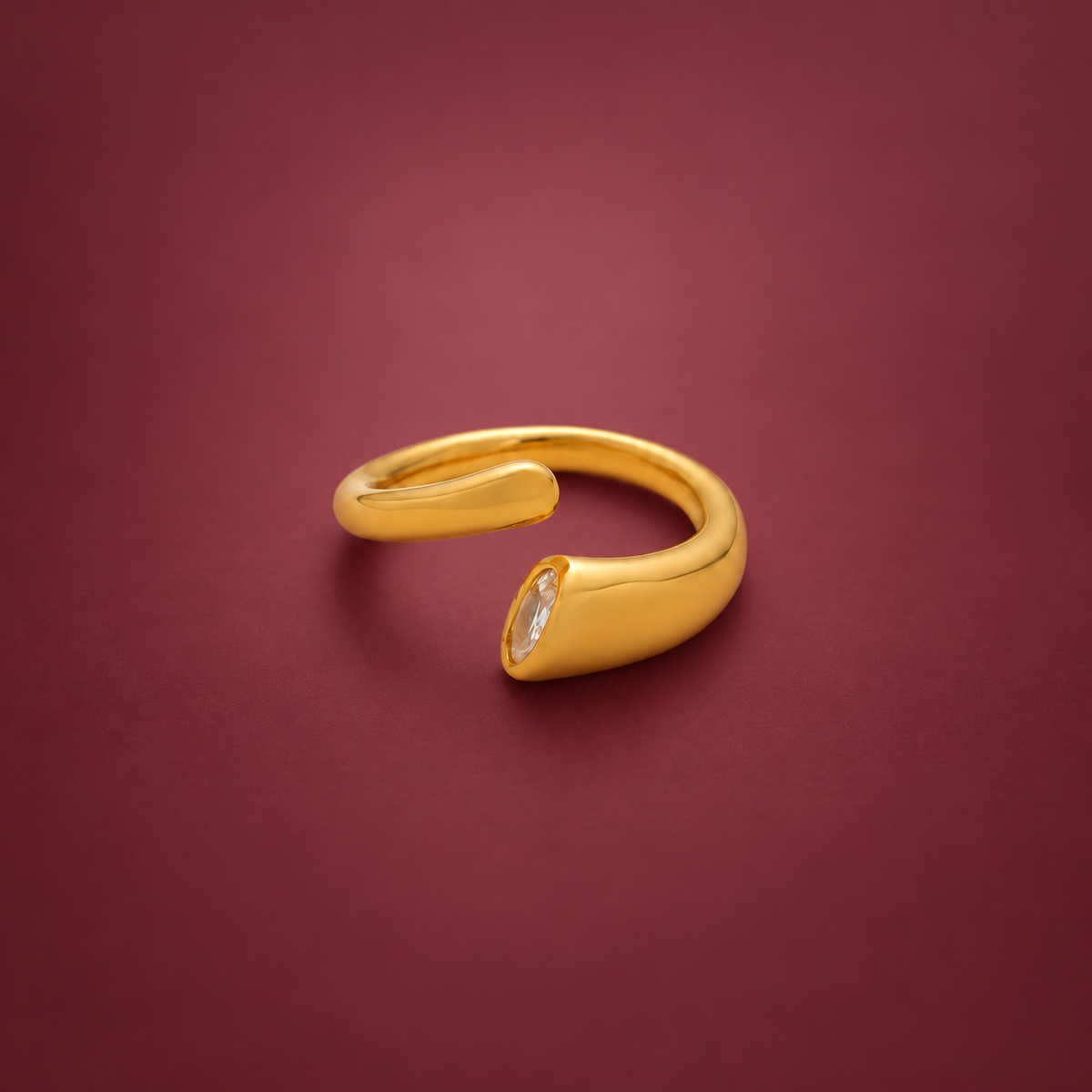 Smooth Open Cuff Ring — muted burgundy background