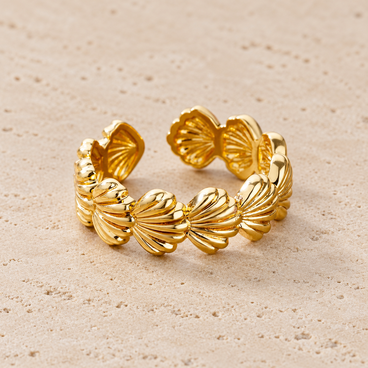 Shell Petal Ring — pale beige natural stone background