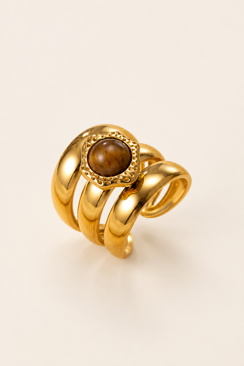 Amber Sculptural Ring — warm ivory background