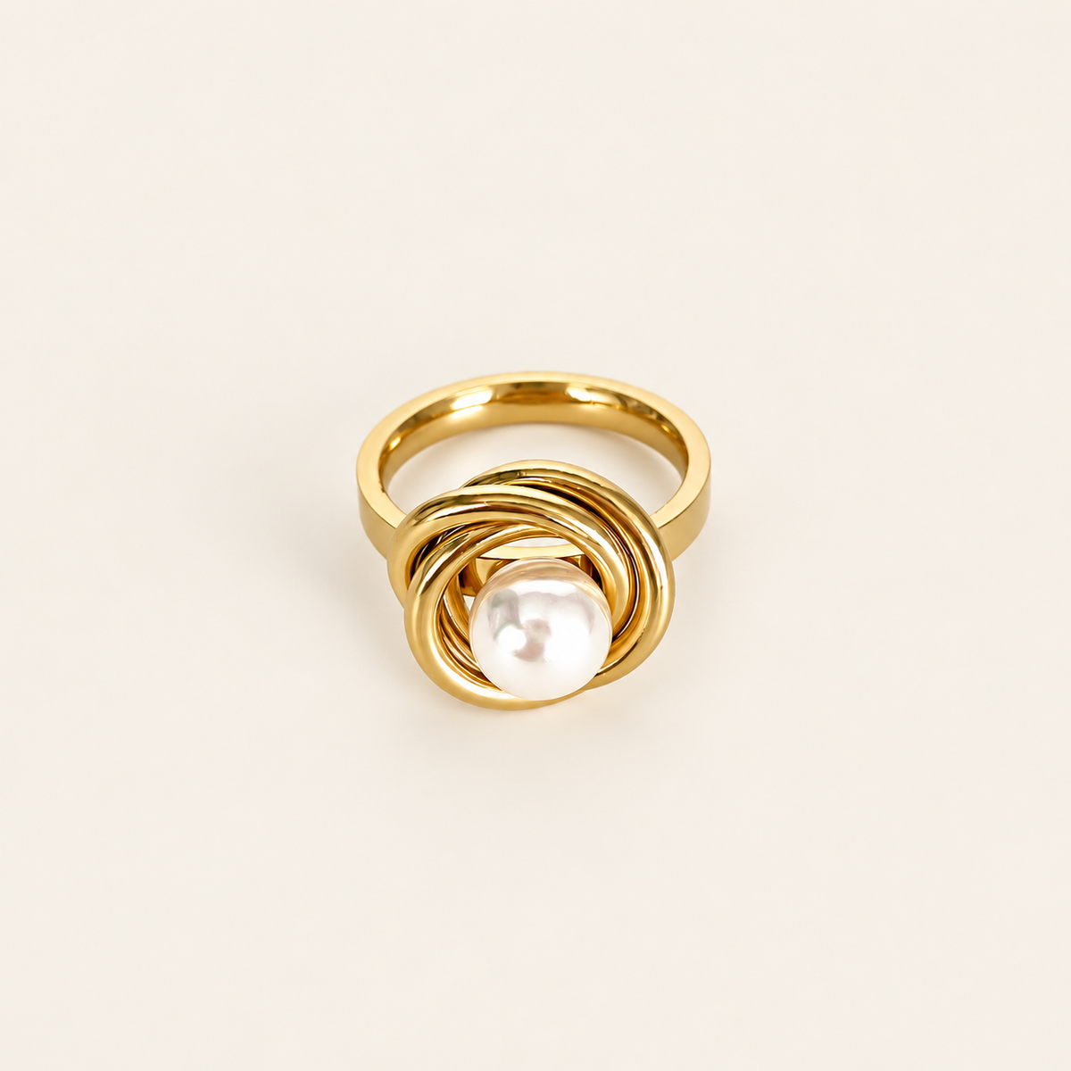 Pearl Spiral Ring — warm ivory background