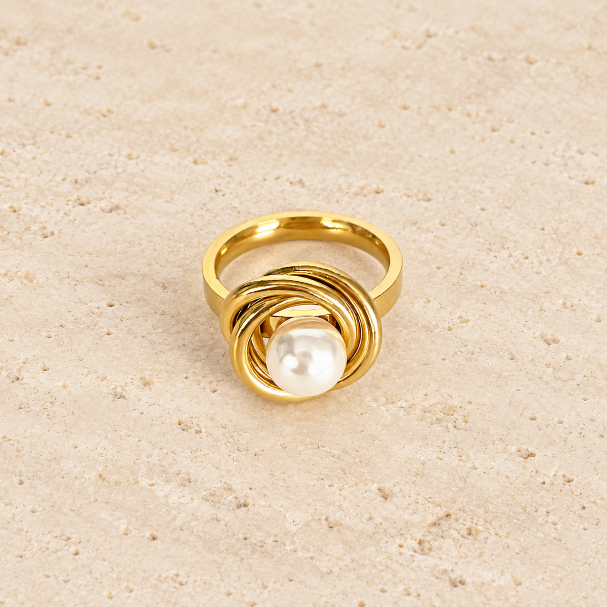 Pearl Spiral Ring — pale beige natural stone background