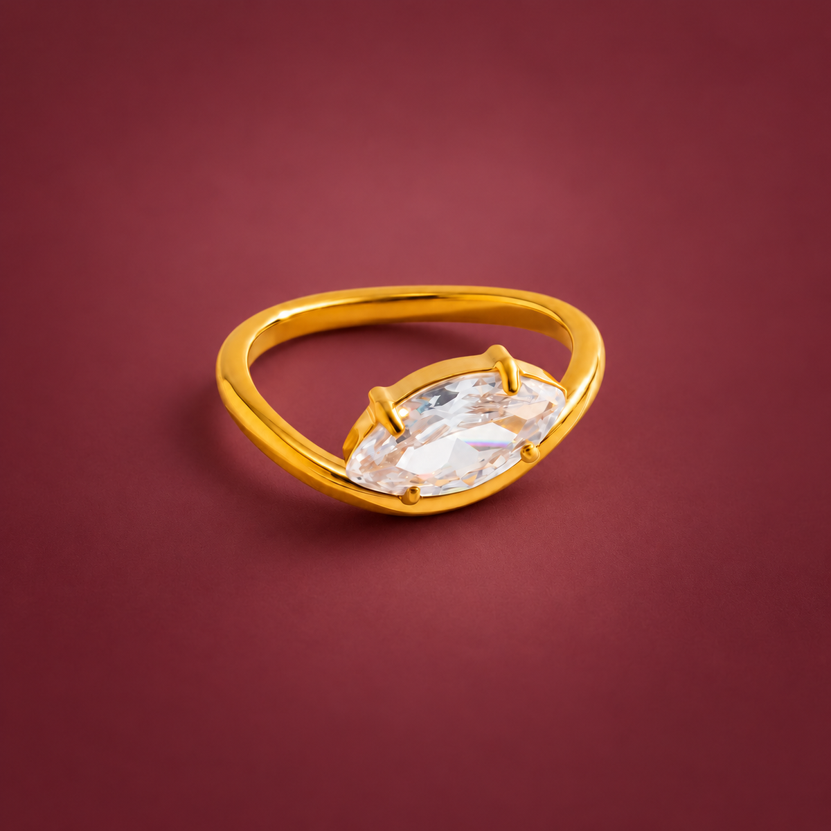Oval Crystal Ring — muted burgundy background