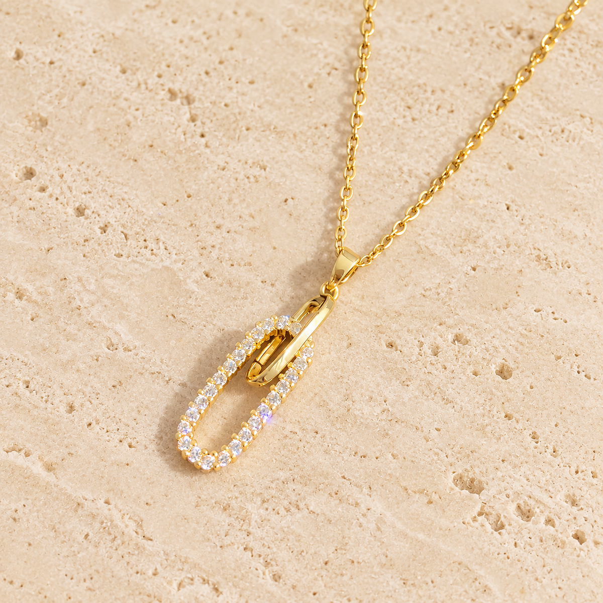 Crystal Oval Pendant Necklace — pale beige natural stone background