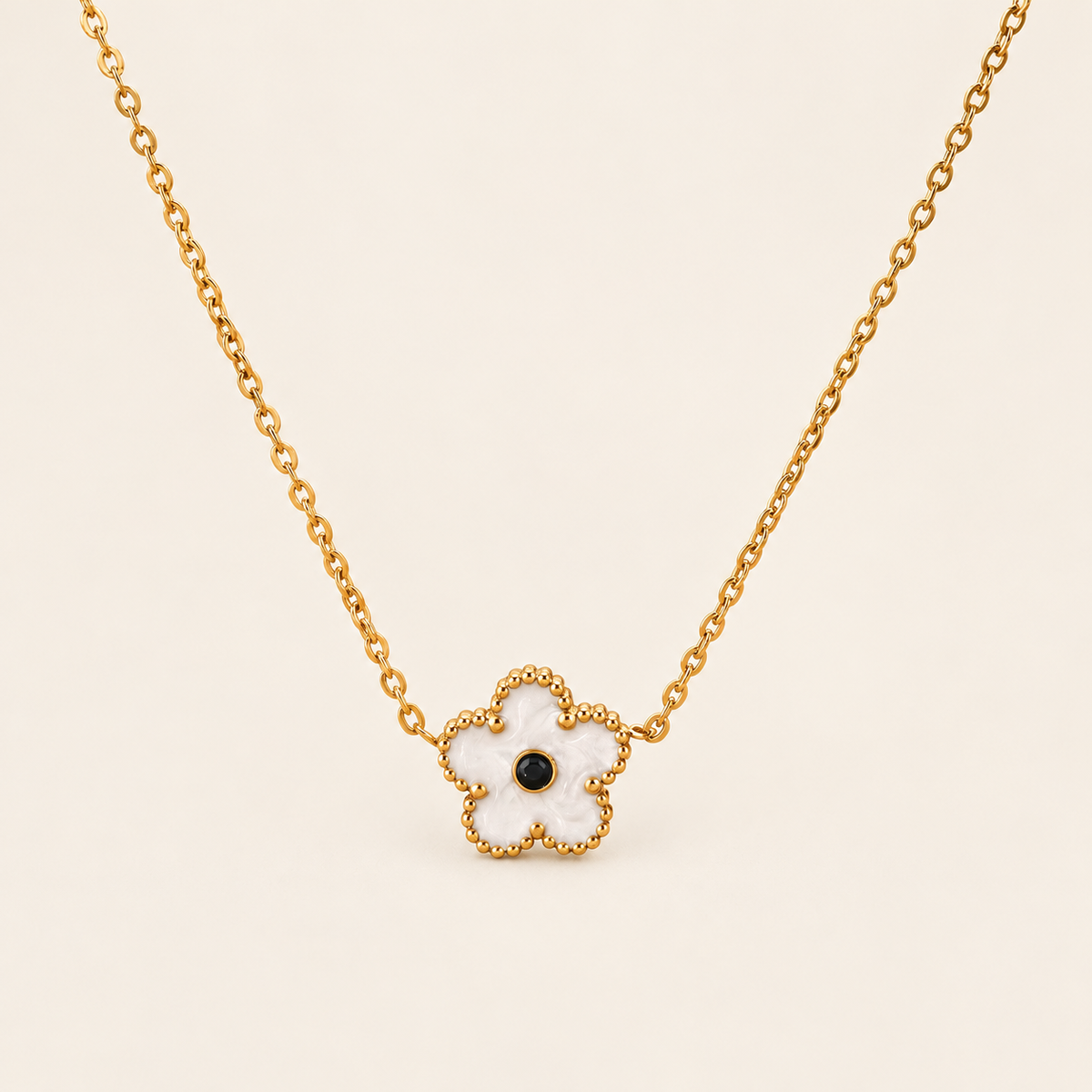 White Flower Necklace — warm ivory background