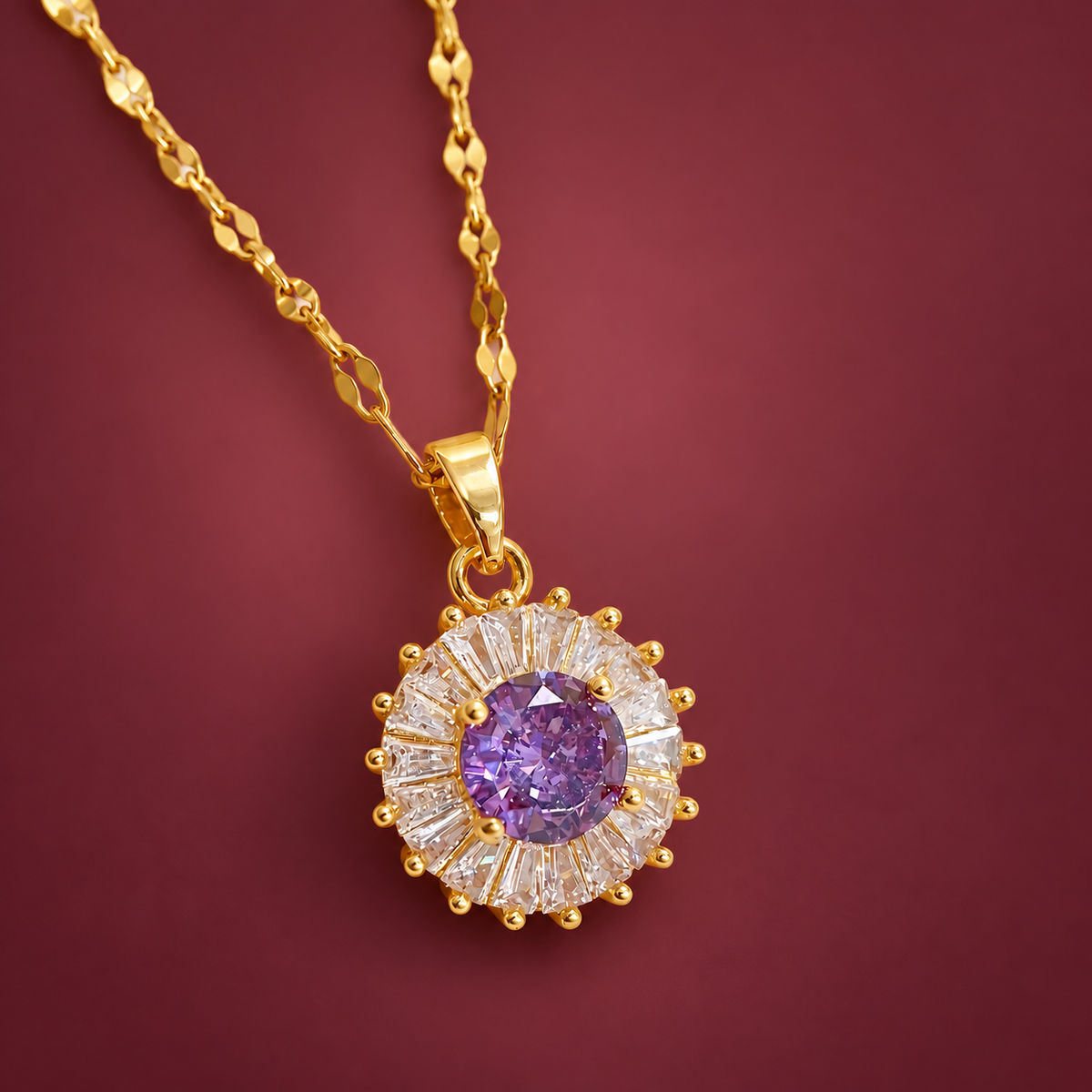 Purple Sun Pendant Necklace — muted burgundy background