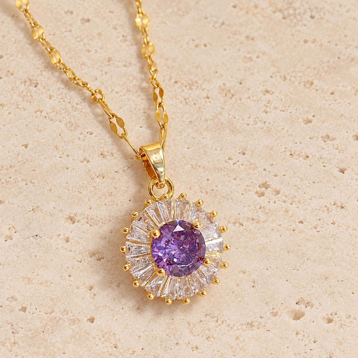 Purple Sun Pendant Necklace — pale beige natural stone background