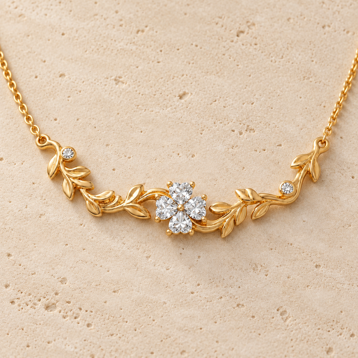 Crystal Leaf Necklace — pale beige natural stone background