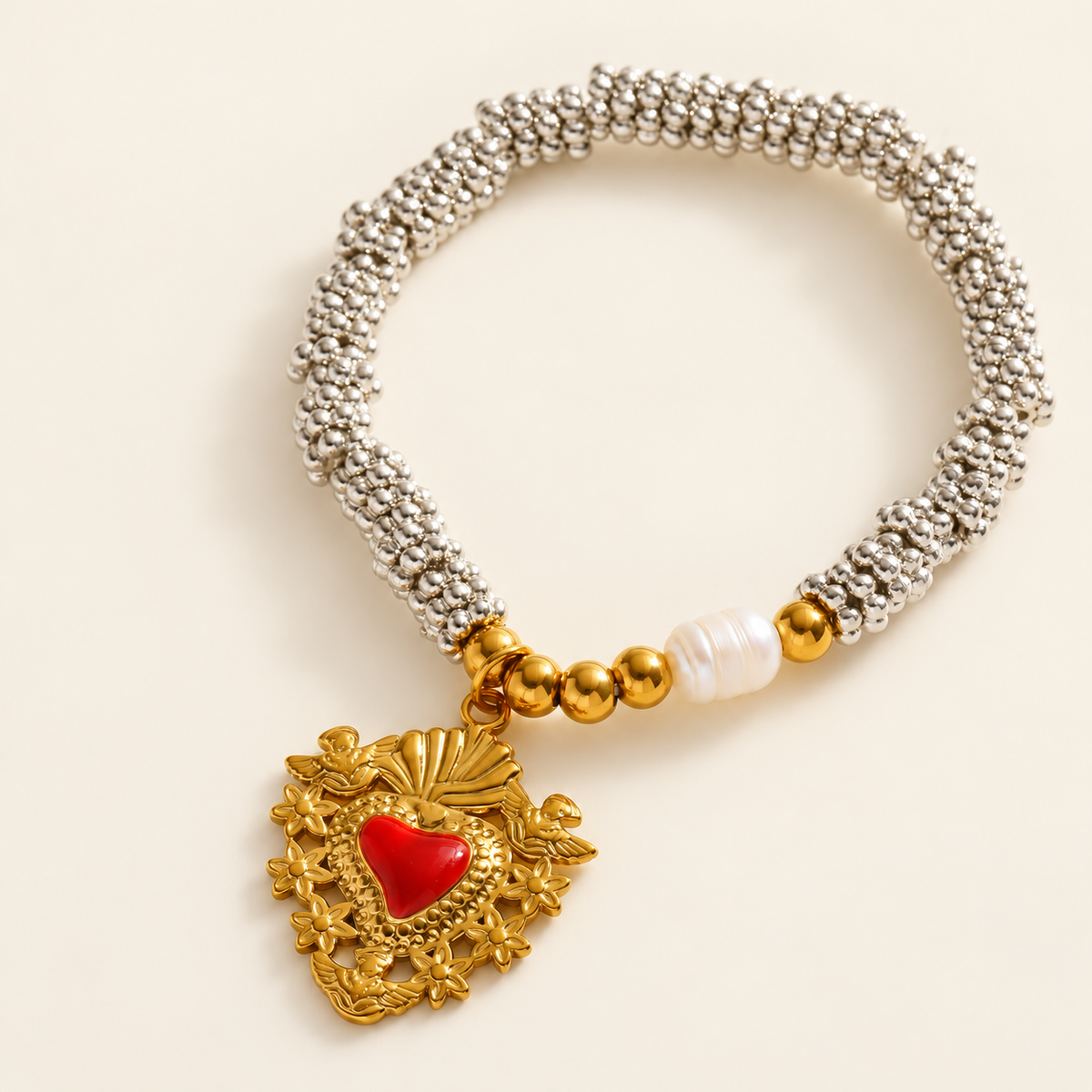 Red Heart Bead Bracelet — warm ivory background