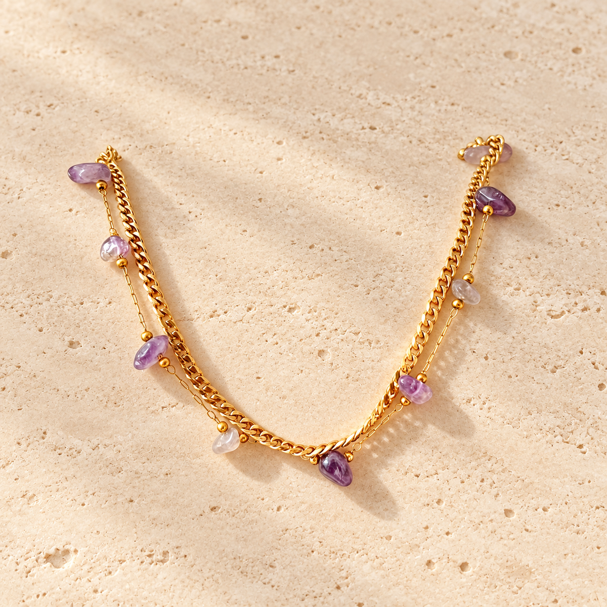 Purple Heart Charm Bracelet — pale beige natural stone background