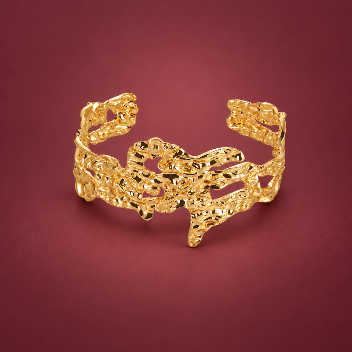 Sculpted Leopard Cuff — muted burgundy background