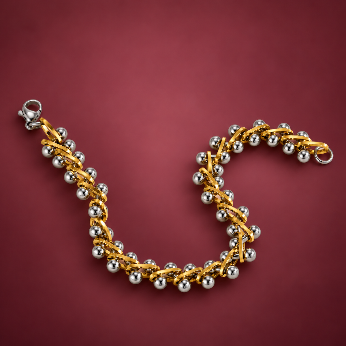 Two-Tone Bead Link Bracelet — muted burgundy background